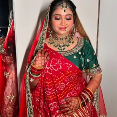 My bride Gauri looking serene and beautiful in her traditional red and green wedding attire.