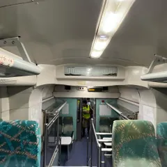The view from one end of the train coach to the other, showing the unique split-level layout.