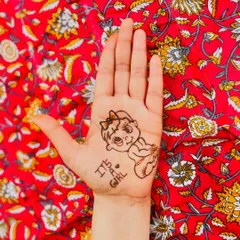 A full view of the 'It's a Girl' baby announcement mehndi. This charming and simple design is a wonderful way to share your happy news with the world.