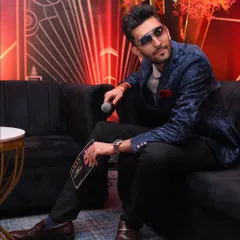 The spark you see on stage begins long before the spotlight hits. Here's a candid moment, soaking in the event's atmosphere before my performance.