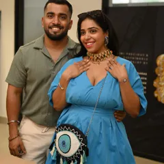 The perfect moment of discovery. A guest tries on a statement choker at a private jewelry salon in our Gurgaon studio, finding a piece that resonates with her personal style.
