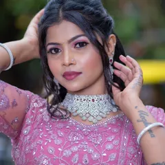 A confident portrait of the model, showing off the beautiful makeup and the sparkling rental jewellery.