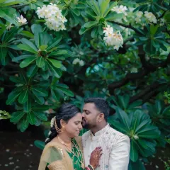 A tender moment shared between the couple during their outdoor engagement shoot. We use natural environments like this beautiful flowering tree to create a soft, romantic backdrop for your love story.