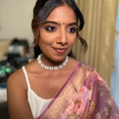 Aarya looking chic and ready for the event. The makeup is designed to enhance her features and last all day, without looking heavy.