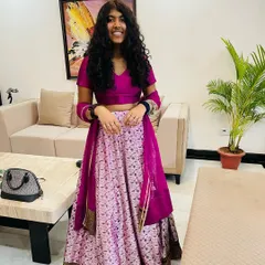 This project was so special to me. I had the honor of transforming a saree passed down through three generations into this adorable lehenga for a young girl. Preserving family memories in a wearable form is the most rewarding part of my work.