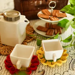 Tea for two, with a splash of colour. These floral coasters are the heart of a cozy moment, perfect for sharing a quiet chat and a warm sip with someone special.