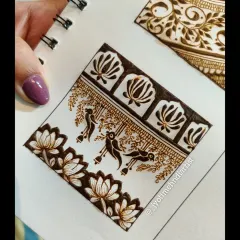 This practice sketch shows how to combine different elements like hanging birds and lotus borders to create a unique band design.