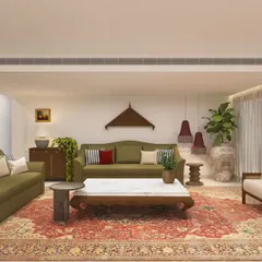 I love layering vintage treasures into freshly designed homes. Here, a traditional Indian-style rug and classic wooden furniture bring warmth and history to a contemporary living space, creating a room that feels both new and familiar.