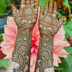 Inspired by the beauty of nature, this design features bold peacock motifs combined with delicate floral patterns and jaal work. A truly gorgeous design.