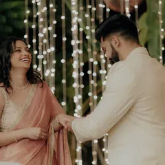 Her joyful reaction just after the ring exchange, a perfect candid moment filled with laughter and happiness.