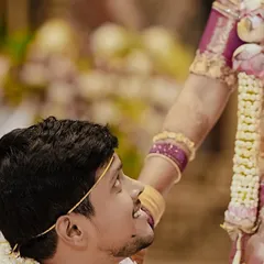 A beautiful, intimate moment from a pre-wedding ceremony. The focus is on the couple's connection, with the bride's makeup kept soft and natural to enhance the raw emotion of the shot.