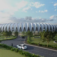 The full view of the Olympic-sized stadium, with a capacity of over 6,000. It is the centerpiece of a sprawling central plaza, designed to foster community and stand out as a unique landmark.