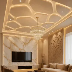 A glimpse into a luxurious living room we designed, featuring a custom gypsum false ceiling with organic curves and integrated cove lighting. The design also includes a marble-finish TV wall panel and carefully selected furniture to create a cohesive, high-end look.