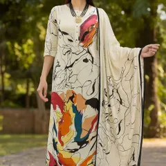 For those who love a pop of color, this abstract printed kurta set is a fantastic choice. The cream base acts as a canvas for a vibrant, artistic design, creating a modern and eye-catching look. It’s an outfit that expresses confidence and creativity.