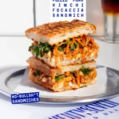 My Pulled Pork Kimchi Focaccia is a flavour bomb. The tender pulled pork, spicy caramelized kimchi, and creamy peanut dressing are all packed into a freshly baked rosemary focaccia.
