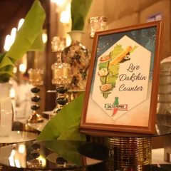 A sign for my 'Live Dakshin Counter', showcasing my ability to provide authentic and fresh South Indian cuisine as part of a diverse menu for any event.