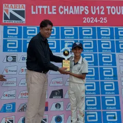 Another one of my young champions receiving his trophy at the U-12 Little Champs Tournament. Age-group cricket is the foundation, and I am proud to see my players excel.