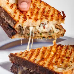The glorious cheese pull of the mushroom melt. This is the kind of satisfying, high-quality sandwich that builds a loyal customer base.