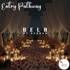 The journey to "yes" begins with a fairytale entrance. I create these pathways using hundreds of candles and fresh rose petals to set a deeply romantic and dramatic tone from the very first step.