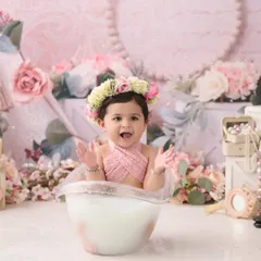 Our milk bath sessions are a unique and gentle way to capture your baby's milestones. We use safe, warm, milky water and fresh flowers for these serene and beautiful portraits.