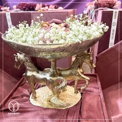 A masterpiece of grace and power, our double-horse bowl is more than a gift; it's a statement centerpiece. Presented in a custom velvet box, this is how I help clients celebrate lasting relationships and unforgettable moments with unparalleled grandeur.