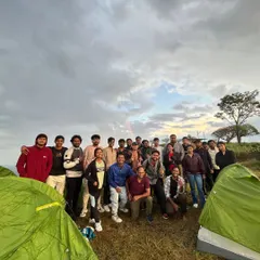 This picture says it all. A great group of people, tents pitched against a stunning sunset, and even a rainbow to top it off. This was a perfect moment from our camping trip at Narayana Giri.