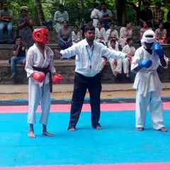 The moment before the fight begins. As a referee, I ensure the fight is fair and the rules of Kyokushin are respected. Two competitors ready to test their skills.