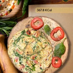 My spinach and tomato omelette is light, protein-packed, and just 367.8 KCal. It's a delicious and colorful way to start your day or for a quick lunch.
