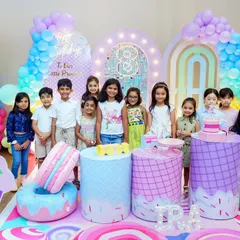 All the friends together. Group photos are a must have at any kid's party. We make sure to gather all the little guests for a fun shot to remember the celebration and the friends who shared it.