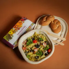 Indulge in layers of flavor with our Creamy Pesto Chicken Parmesan. It's a healthier take on a classic comfort dish, with crispy chicken, cheesy goodness, and a delicious pesto sauce.