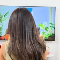 Another view of the color correction, showing the smooth, even, and healthy-looking finish after fixing a previous color job.