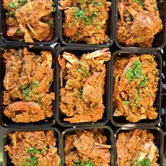 You are looking at my Mangalorean Crab Sukka, packed and ready for delivery. I cook fresh crabs in a dry masala with grated coconut and cilantro, a true coastal delicacy.