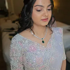 A close-up of Sakshi's Roka makeup. I used soft pinks and purples on her eyes to match the delicate embroidery on her lehenga.