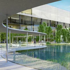 At the Amara Raja Net-Positive campus, we designed this curved walkway over a naturalized water body. It connects different parts of the campus, encouraging movement and interaction while immersing employees in a serene, natural environment dedicated to energy research.