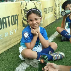 A smiling student from our toddlers' program, where we introduce football in a fun and engaging way.