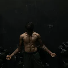The result of discipline and hard work. The physique of an athlete is built through consistent training, combining strength work with conditioning like MMA and boxing.