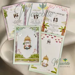 A modern design with a touch of Indian traditional Pichwai theme. This image shows the main card along with a full set of matching inserts for different wedding functions.