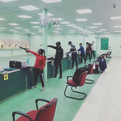 A typical day of practice at the Siri Fort Shooting Range. You can see a full line of my students, each focused on their target, building the discipline that marksmanship requires.