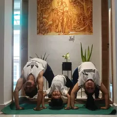 My family is my biggest motivation. Here we are practicing the wheel pose (Chakrasana) together at home, with my son right in the middle, making it a fun challenge for all of us.