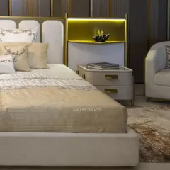 Another view of our Solitaire bed, showcasing its sleek metal skirting and the seamless integration of the side table. This piece is a centerpiece on its own, eliminating the need for additional wall decor to create a stunning, modern bedroom.
