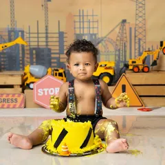 Work in progress: turning one! This construction-themed cake smash, with toy trucks and a custom cake, was so much fun to put together for this little builder's big day.