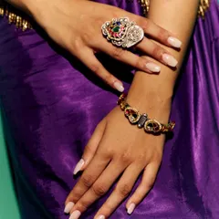 A detail shot focusing on the accessories for the Myntra shoot. I paired the purple outfit with a statement ring and bracelet to complement the intricate embroidery of the vest.