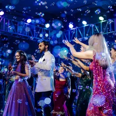 A bubble-filled dance floor! Capturing the couple and their friends dancing through a sea of bubbles at their Sangeet.