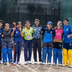 This is what our cricket family looks like. A group of our dedicated players sharing a moment of camaraderie after a tough training session in the nets. We believe a supportive team environment is just as important as the drills.