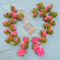 An everlasting wedding garland, or varamala, for a very special day. I crochet each rosebud and leaf by hand and string them with delicate pearls to create a keepsake that will last a lifetime. I can customize the colors to match your wedding theme.