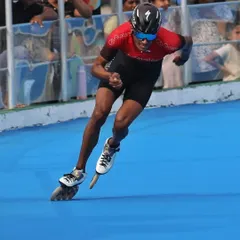 Dhanush Babu cornering at high speed on the skating rink. His technique and power are what make him a national champion and an Asian triple medalist.