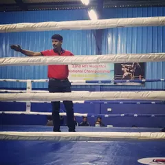 Here I am officiating a bout at the 22nd MTI Muaythai National Championship. My experience as a certified referee gives my students an edge, as I teach them the official rules and what judges look for in a fight.