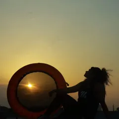 A moment of peace after a sunset trampoline session. This unique form of exercise is as good for the soul as it is for the body.