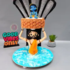 One of my most divine creations, this anti-gravity cake depicts Vasudeva carrying baby Krishna across the Yamuna. It's a tribute crafted with complete devotion and structural precision.