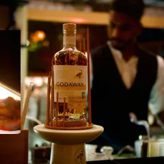 A bottle of Godawan 'Fruit & Spice' single malt, the star of our new menu preview. This image highlights our collaboration with premium Indian brands to create unique and localized fine dining experiences.